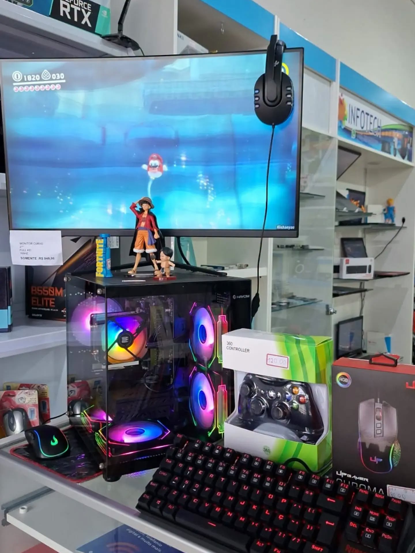 Setup gamer com monitor curvo, PC RGB e periféricos